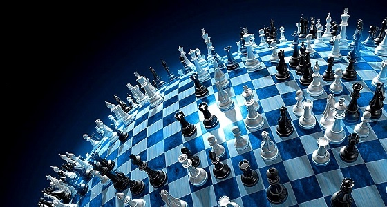 A large chess board with many chess pieces on it